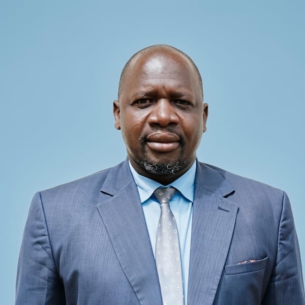 Mr. James Mukabi, COMPANY SECRETARY